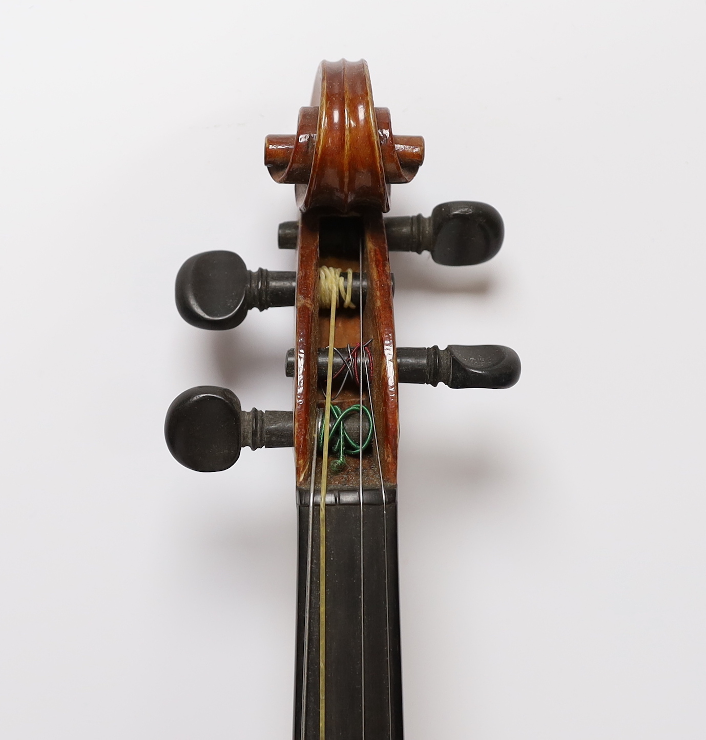 A cased 3/4 sized student violin marked Dresden, with reproduction Stradivarius label
